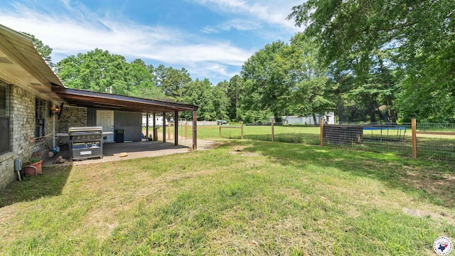 1599 Myrtle Springs Rd, Texarkana, TX 75503 - view of yard with a trampoline and a patio area