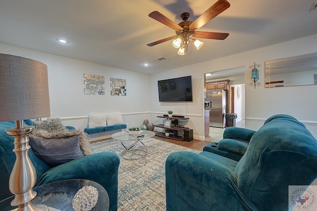 living room featuring ceiling fan