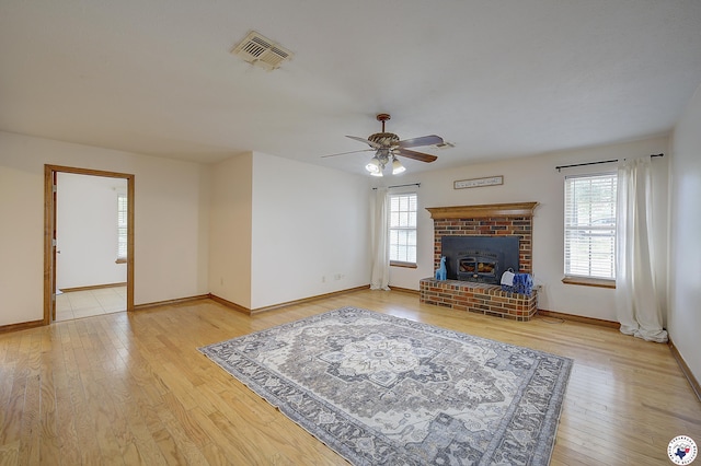 1121 Kelly Rd, Texarkana, TX 75501 - living area featuring light wood-type flooring, a ceiling fan, and baseboards
