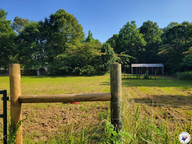 1121 Kelly Rd, Texarkana, TX 75501 - view of yard featuring a carport