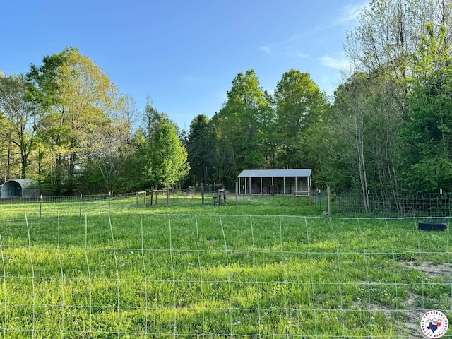 1121 Kelly Rd, Texarkana, TX 75501 - view of yard featuring an outdoor structure
