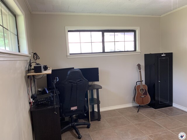 308 Eleanor St, Atlanta, TX 75551 - office area with healthy amount of natural light, tile patterned floors, and ornamental molding