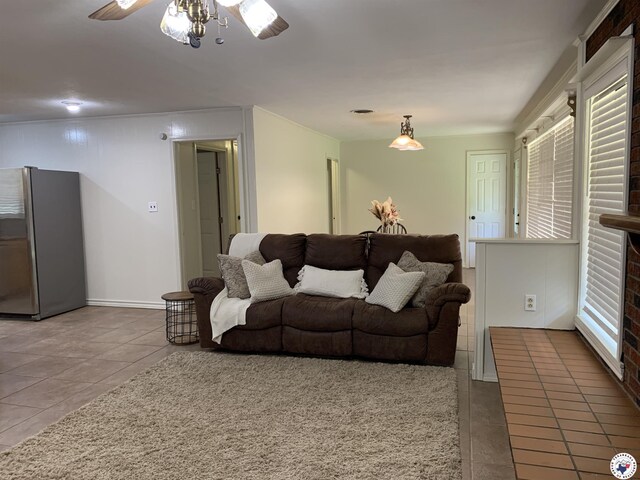 308 Eleanor St, Atlanta, TX 75551 - living area with tile patterned flooring and ceiling fan