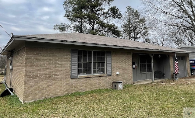 view of home's exterior with a yard