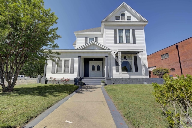 501 Main St, Texarkana, TX 75501 - view of front of property featuring a front lawn and fence