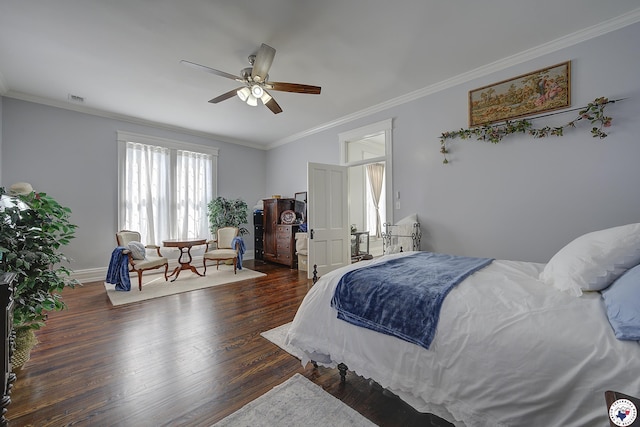 501 Main St, Texarkana, TX 75501 - bedroom featuring a ceiling fan, crown molding, wood finished floors, baseboards, and visible vents