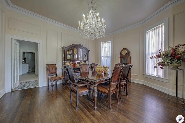 501 Main St, Texarkana, TX 75501 - dining room featuring dark wood-style flooring, crown molding, and a chandelier