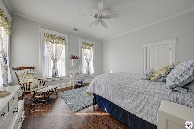 501 Main St, Texarkana, TX 75501 - bedroom with a ceiling fan, crown molding, baseboards, dark wood-style flooring, and visible vents