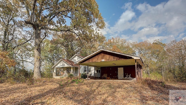 view of front of house with a carport