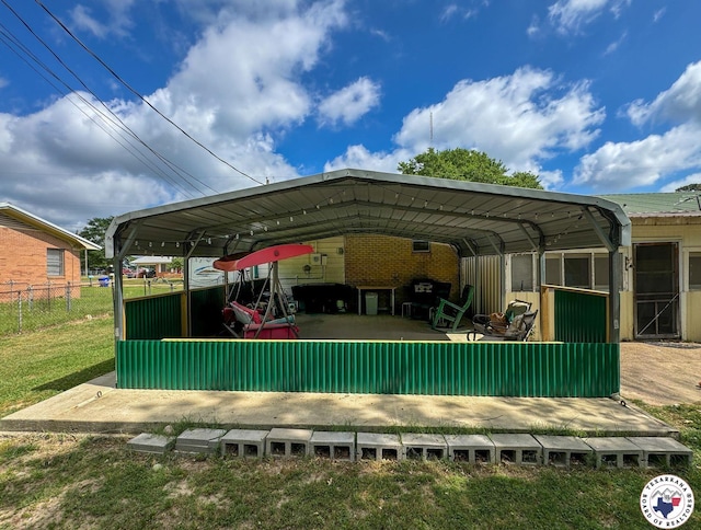 1004 Hillcrest St, Linden, TX 75563 - view of patio featuring a carport