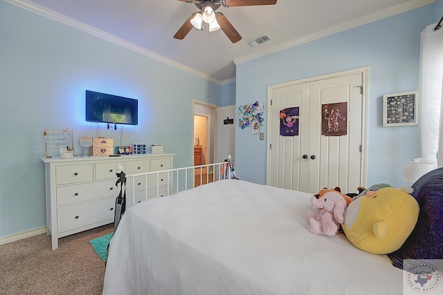 carpeted bedroom featuring ceiling fan and ornamental molding