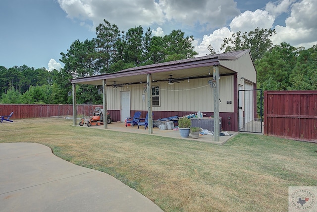 view of outbuilding with a lawn