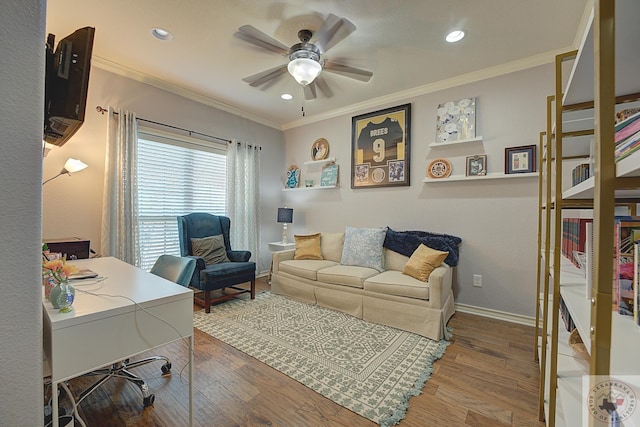 office featuring hardwood / wood-style floors, ceiling fan, and ornamental molding