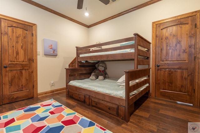 bedroom featuring ceiling fan, ornamental molding, and dark hardwood / wood-style flooring