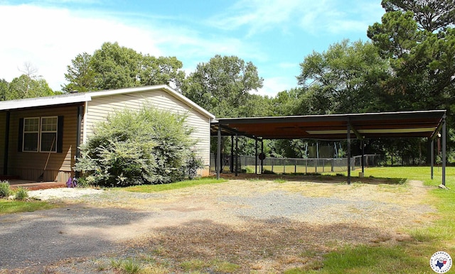 632 White Oak Rd, Maud, TX 75567 - view of side of home featuring driveway