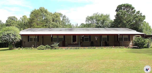 632 White Oak Rd, Maud, TX 75567 - view of front of property with a front lawn, covered porch, and a metal roof