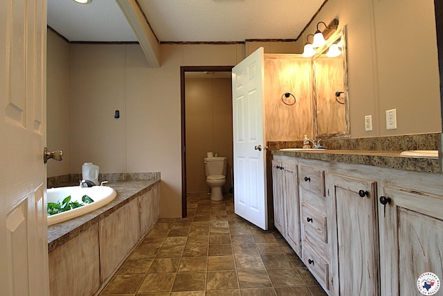 632 White Oak Rd, Maud, TX 75567 - bathroom with double vanity, a garden tub, ornamental molding, and stone finish flooring