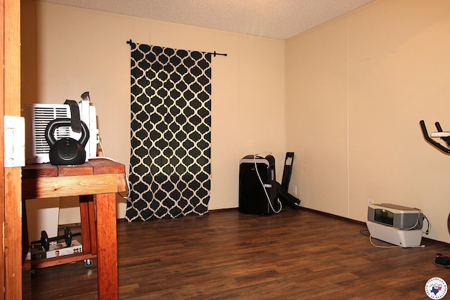 632 White Oak Rd, Maud, TX 75567 - interior space with dark wood-style floors and a textured ceiling