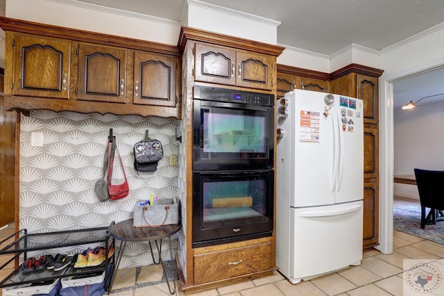 kitchen with backsplash, light tile patterned flooring, ornamental molding, black double oven, and white fridge