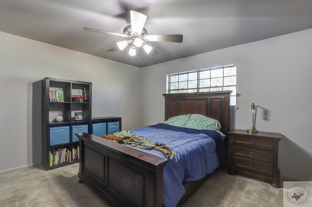 bedroom with light colored carpet and ceiling fan