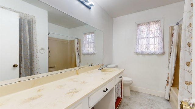 full bathroom featuring toilet, vanity, and shower / tub combo with curtain