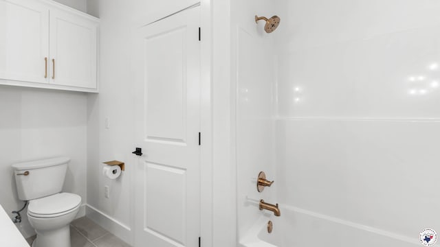 7312 Shadow Brooke, Texarkana, TX 75503 - bathroom featuring toilet, tile patterned flooring, and washtub / shower combination
