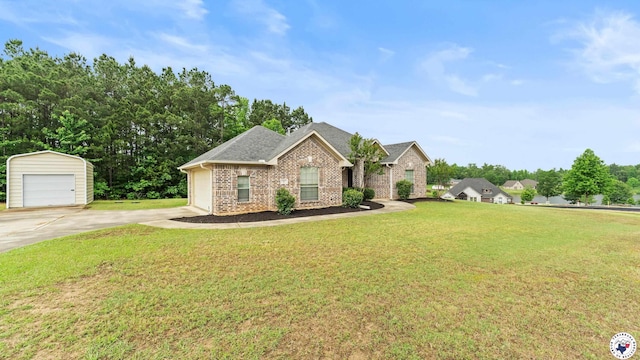 6 Meredith Way, Texarkana, TX 75501 - view of front of house featuring a detached garage, brick siding, an outdoor structure, and a front yard