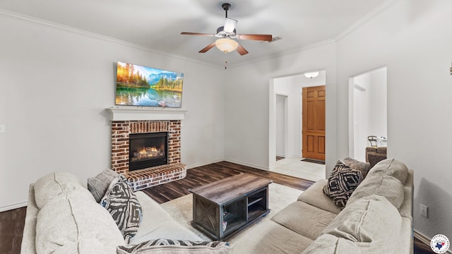 6 Meredith Way, Texarkana, TX 75501 - living area featuring ceiling fan, a brick fireplace, wood finished floors, baseboards, and ornamental molding