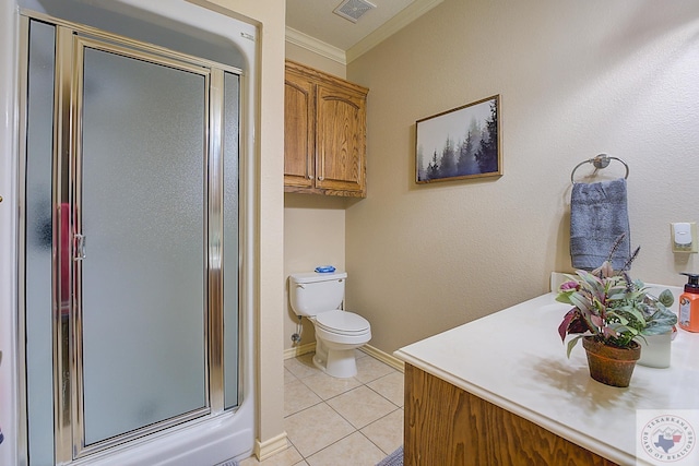 bathroom with toilet, crown molding, tile patterned floors, vanity, and a shower with door