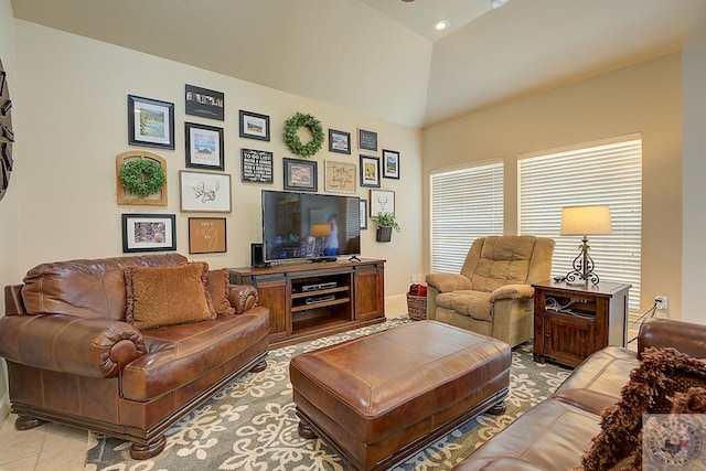 tiled living room featuring high vaulted ceiling