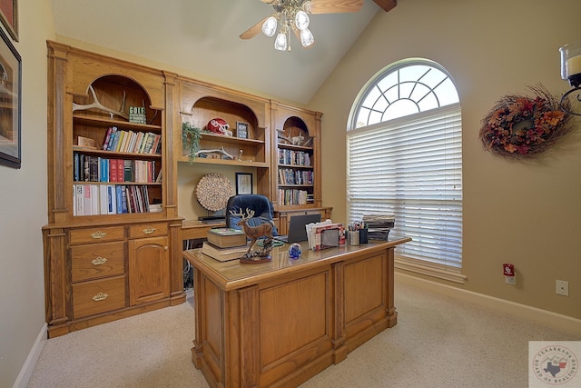 carpeted office featuring ceiling fan and vaulted ceiling