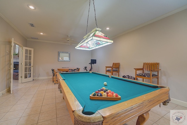 recreation room with french doors, tile patterned floors, ceiling fan, and ornamental molding