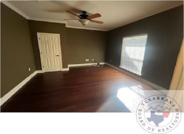 empty room with crown molding, hardwood / wood-style flooring, and ceiling fan