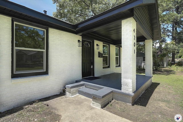 4201 Pine St, Texarkana, TX 75501 - property entrance with brick siding and a porch