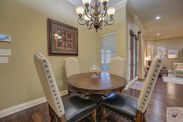 dining area with a notable chandelier, crown molding, and dark hardwood / wood-style floors