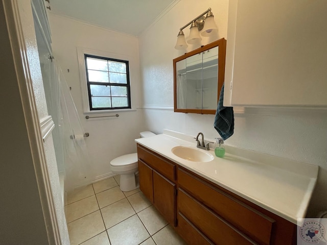 bathroom featuring vanity, toilet, ornamental molding, and tile patterned flooring