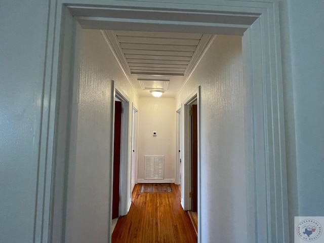 corridor featuring wood-type flooring