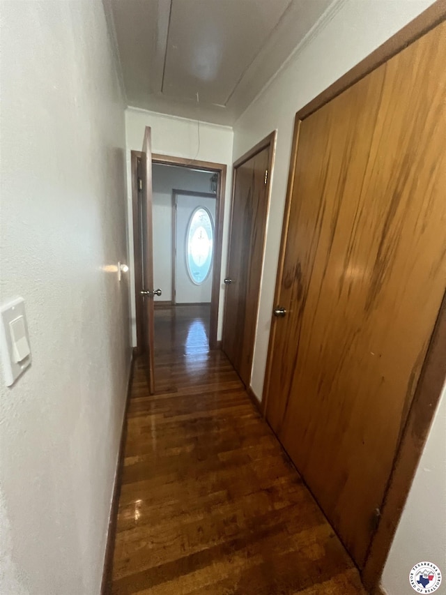 2808 W Main, Atlanta, TX 75551 - corridor with attic access and wood finished floors
