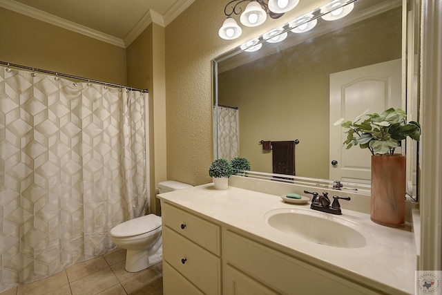 bathroom featuring vanity, toilet, crown molding, and tile patterned flooring