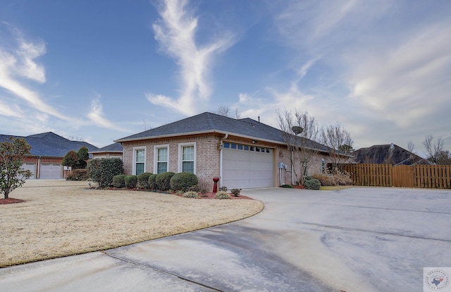 ranch-style house featuring a garage