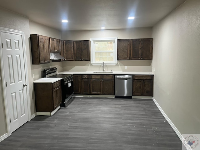 kitchen featuring dark wood-type flooring, sink, appliances with stainless steel finishes, and dark brown cabinets