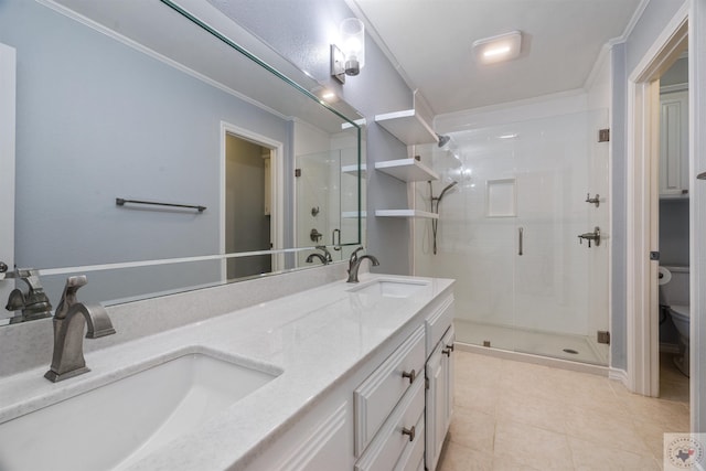 bathroom with a sink, toilet, and a shower stall