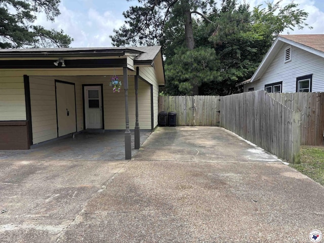 3703 Hickory St, Texarkana, AR 71854 - view of parking / parking lot featuring driveway and an attached carport