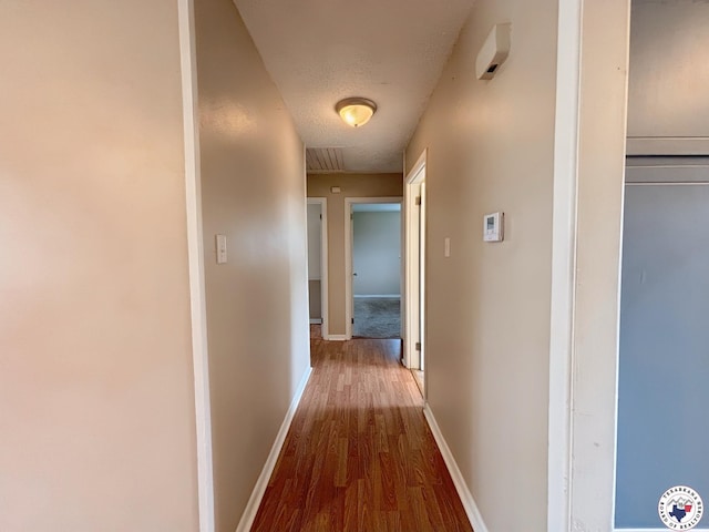 3703 Hickory St, Texarkana, AR 71854 - hallway featuring wood finished floors and baseboards