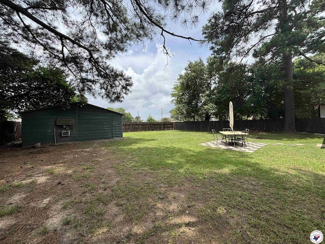 3703 Hickory St, Texarkana, AR 71854 - fenced backyard featuring a patio area