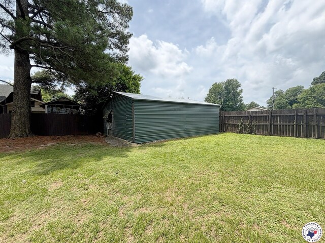 3703 Hickory St, Texarkana, AR 71854 - view of yard featuring an outbuilding