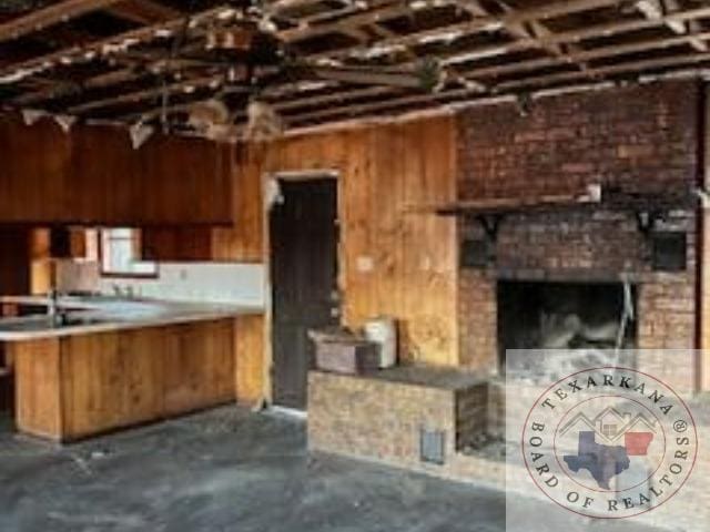 kitchen with a brick fireplace