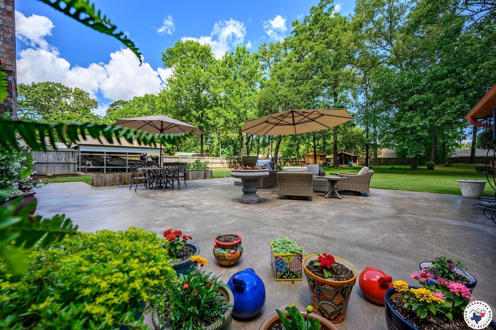 5802 Forest Grove Rd, Texarkana, TX 75503 - view of patio featuring outdoor dining space