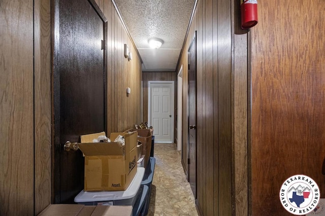 203 Pleasant Vly, Texarkana, AR 71854 - hall with wood walls and a textured ceiling