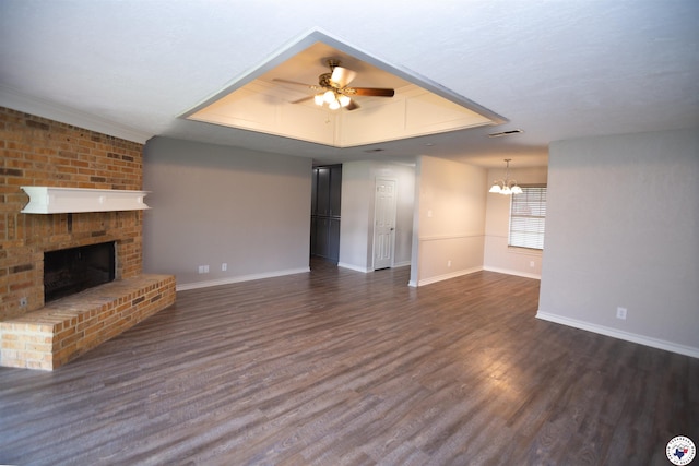 4718 Charleston St, Texarkana, AR 71854 - unfurnished living room with a ceiling fan, baseboards, dark wood-style floors, and a chandelier